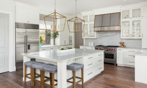 Modern new kitchen with updated appliances and stylish finishes, representing a recently purchased home with Strategy Home Loans in Norfolk, Virginia.